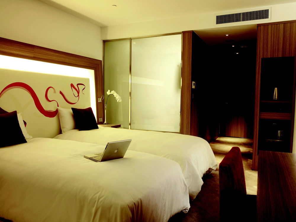 Hyatt Regency Taoyuan International Airport Exterior foto A room at the hotel