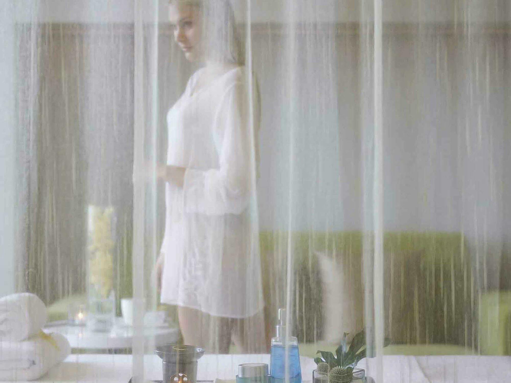 Hyatt Regency Taoyuan International Airport Exterior foto A woman in a spa